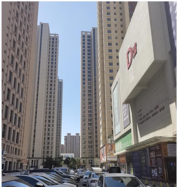内蒙古呼和浩特市玉泉区锡林郭勒南路闻都城市广场综合商业裙房（闻都建材城D馆）一至五层房产包含楼内全部不可移动的配套设施、设备等整体资产以及地下停车场房产